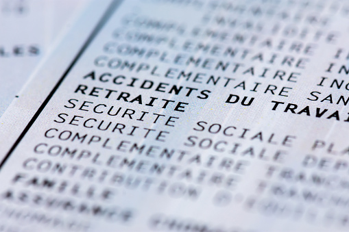 Close up on a french payroll showing various social security contributions