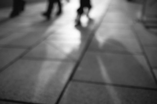 istock defocused backlit commuters on a Manchester street. 1128442249
