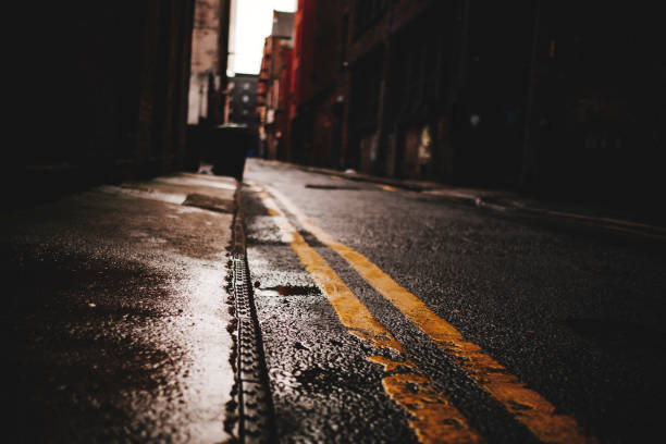 istock Dark gritty urban alleyway, Manchester, England. 1128442265