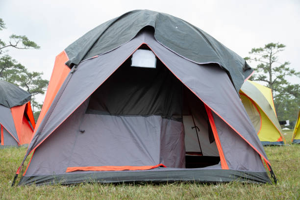 istock Camping tent in the forest for tourists to stay. 1128442321