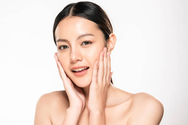 beautiful young asian woman with clean fresh skin - making human hair human face cosmetics imagens e fotografias de stock