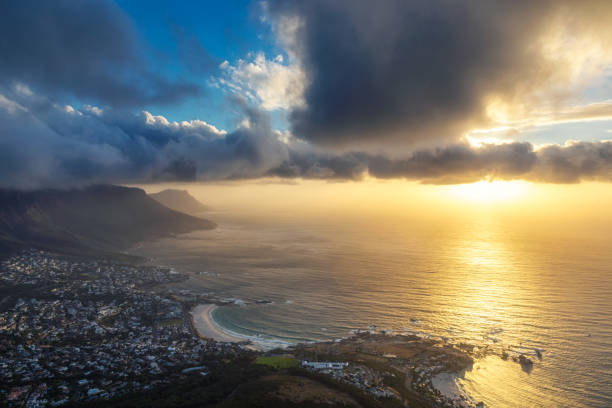 istock Lion's head top view at sunset with beatiful clouds in the sky 1128445640