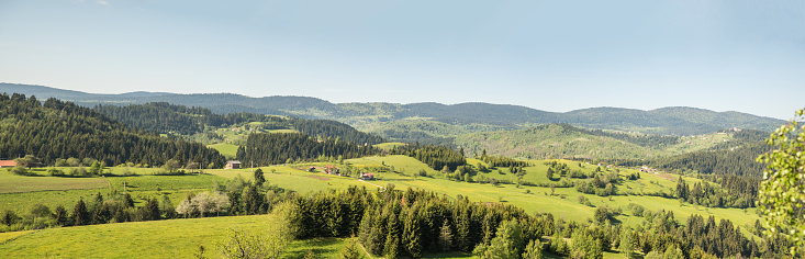 Beautiful landscape view of mountain scenery in springtime. Shot on Zlatar mountain in Serbia. Wide panoramic photo.