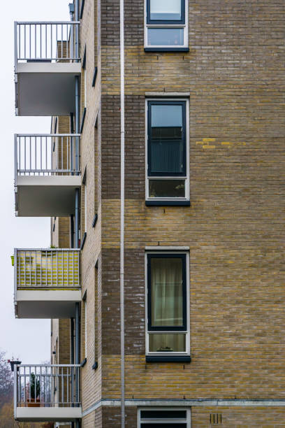 istock Modern dutch city architecture, apartments complex with balcony's and windows 1128447781
