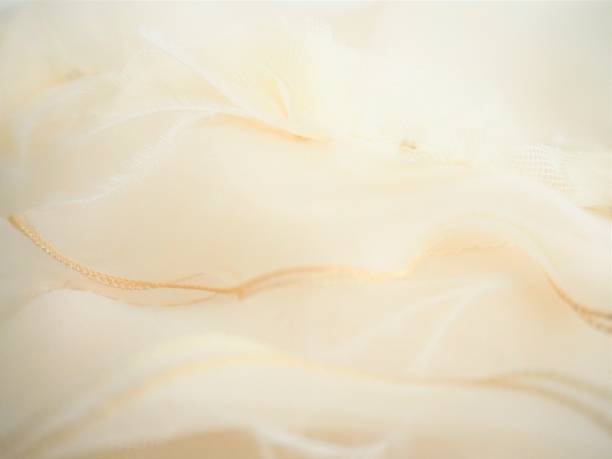 istock Ivory tulle chiffon background with wedding concept 1128448116