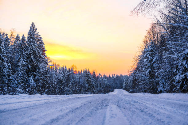 istock winter road at the sunset 1128449409