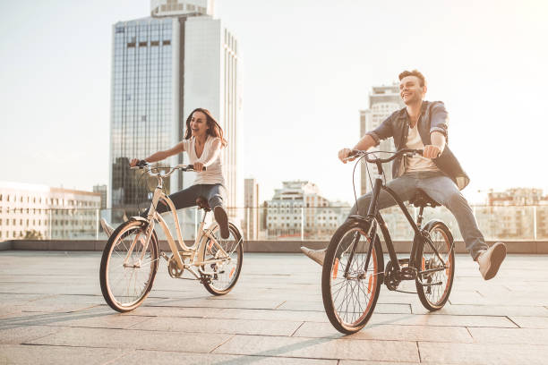 istock Romantic couple with bicycles in the city 1128451932