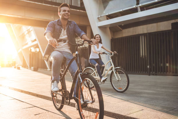 istock Romantic couple with bicycles in the city 1128451948