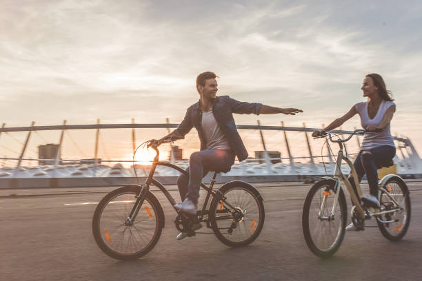 istock Romantic couple with bicycles in the city 1128452548
