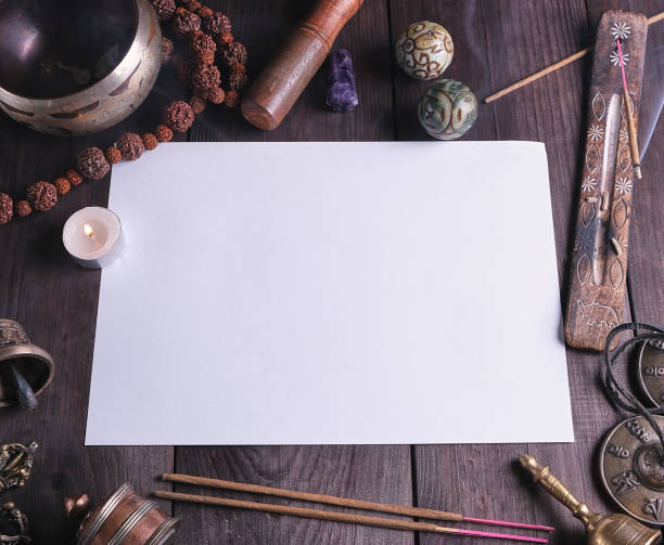 istock blank white sheet in the middle of religious objects for meditation 1128452551