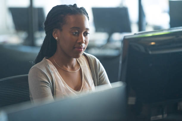 istock Successful businesswoman working at her desk 1128452732