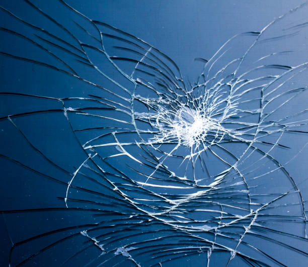 istock Shattered Tablet Glass Screen Close Up Abstract 1128454977