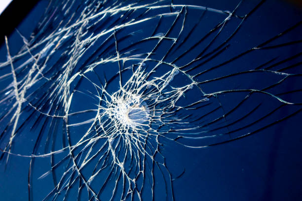 istock Shattered Tablet Glass Screen Close Up Abstract 1128455688