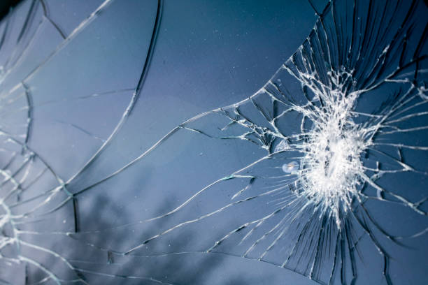 istock Shattered Tablet Glass Screen Close Up Abstract 1128456379