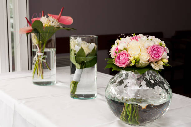 istock Beautiful wedding flowers on white table 1128457072