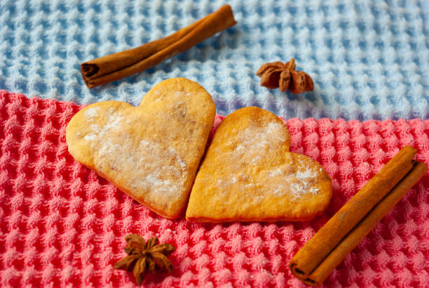 istock Heart-shaped cookies on bright background 1128458166