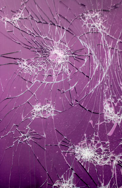 istock Shattered Tablet Glass Screen Close Up Abstract 1128458562