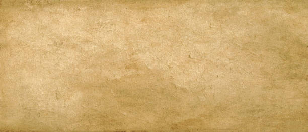 istock Long and wide background in horizontal position. Yellow rustic old cracked paper. Vintage texture. 1128458665
