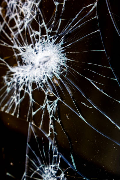 istock Shattered Tablet Glass Screen Close Up Abstract 1128459417