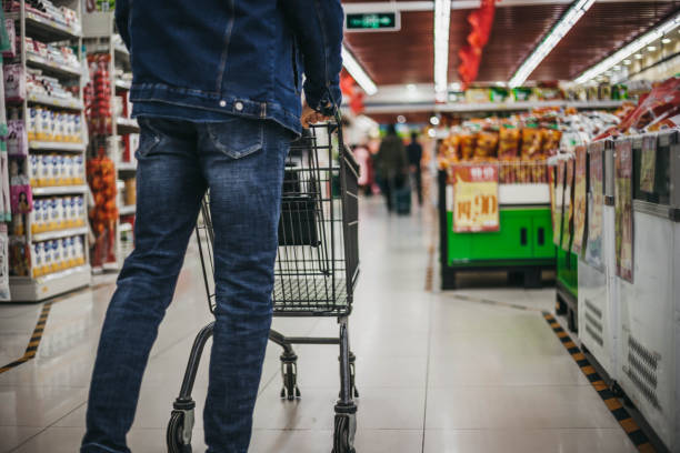 istock Mid age man in shopping 1128459826