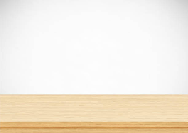 Empty brown wood table top on gray background. Template mock up for display of product Empty brown wood table top on gray background. Template mock up for display of product wood table stock illustrations