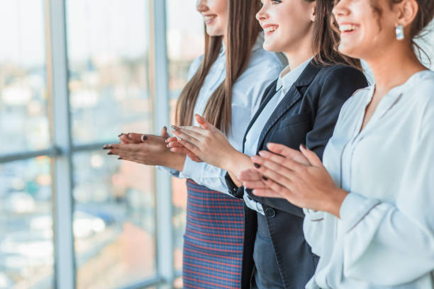 istock Three businesswomen working in the office. Positive workplace concept. 1128466453