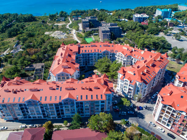istock residential complex in Gelendzhik on the beach top view 1128466645