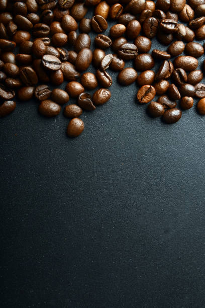 istock Coffee beans. On a wooden background. Top view. Copy space. 1128469772