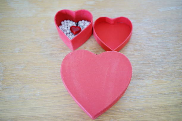 istock Red and white heart. Gift package as a heart 1128471333