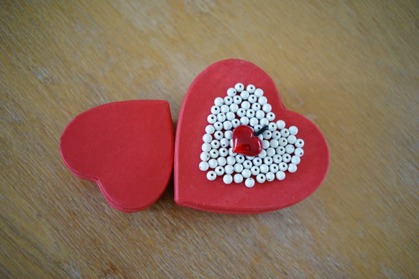 istock Red and white heart. Gift package as a heart 1128471442