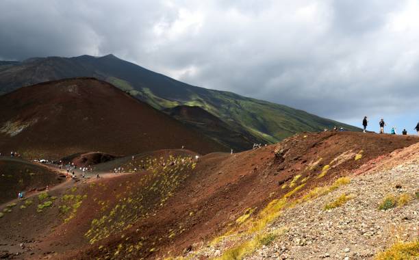 istock Walking along the ridge and inside the crater 1128476296