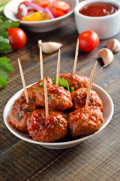 istock Tasty meatballs in white bowl 1128476384