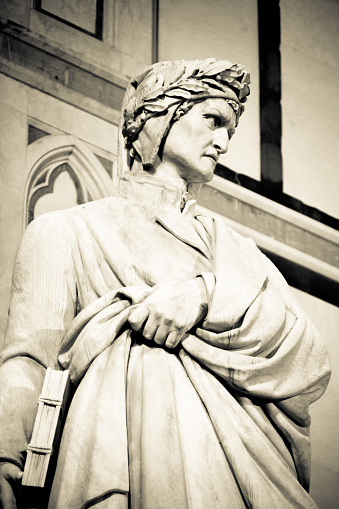 Dante Alighieri statue in Santa Croce square in Florencein black and white, ItalyDante Alighieri statue in Santa Croce square in Florence at night, Italy