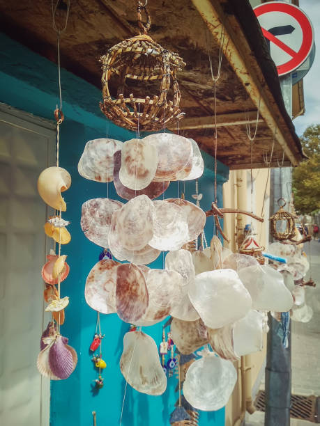 istock Pendant made with large flat sea shells - a traditional Mediterranean souvenir 1128481024