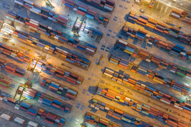 istock Logistics and transportation of Container Cargo ship and Cargo working crane bridge in shipyard 1128482058