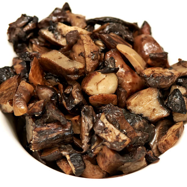 istock fried mushrooms slices on white background square ingredient 1128482267