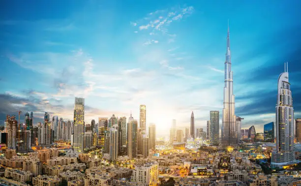 Dubai sunset panoramic view of downtown. Dubai is super modern city of UAE, cosmopolitan megalopolis.