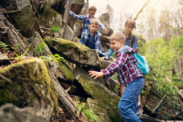 istock Family hiking in mountains 1128484752