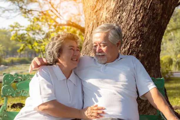 Photo of Happy life and long lived concept. Beautiful older woman feel happiness when grandma stay with beloved husband or grandfather. Charming grandparent love each other for long time. They have good health