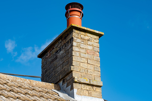 Part of the roofing can also be seen together with some of the tiles on the period home.