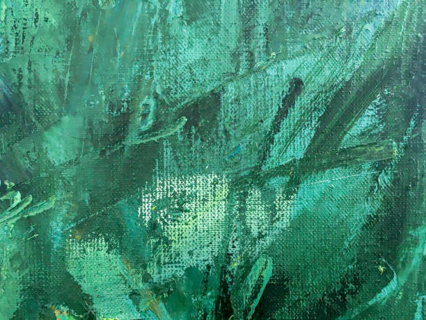 istock hand painted canvas in oil green paint 1128490038