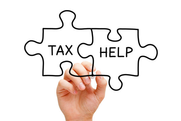 istock Tax Help Jigsaw Puzzle Concept 1128491565