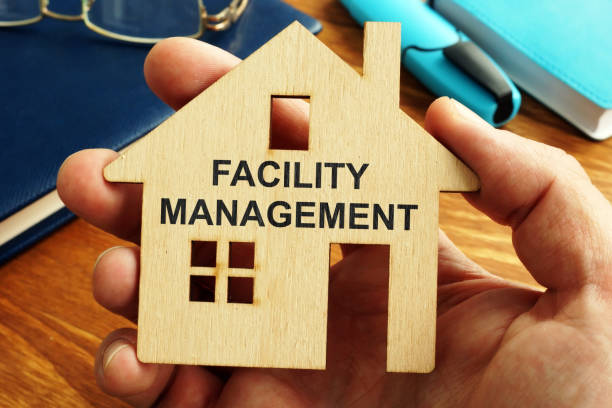 istock Facility management written on the small house. 1128492039
