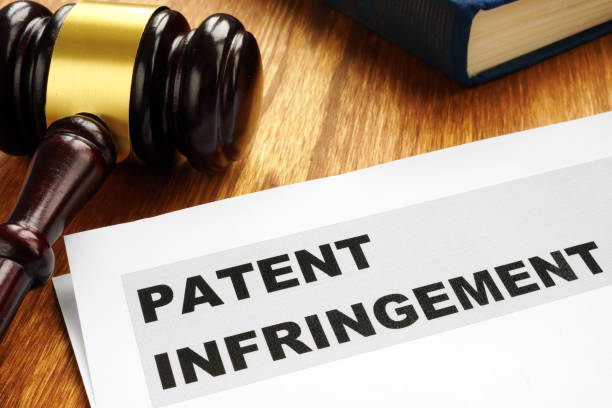 istock Patent infringement and gavel. Copyright law concept. 1128492746