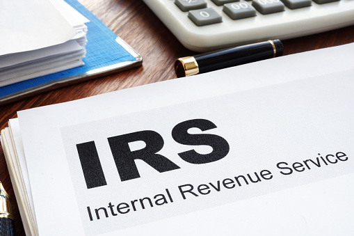 IRS Internal Revenue Service documents and folder.