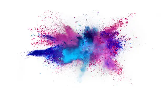 Photo of Multi colored powder explosion isolated on white