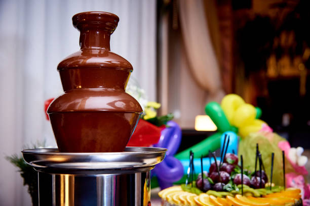istock Chocolate fountain on the holiday table. 1128494915