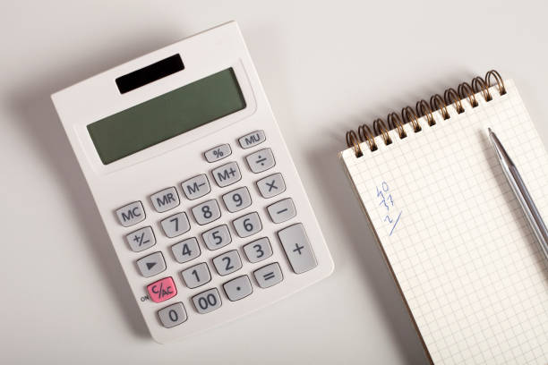 istock calculator and tax papers 1128501031