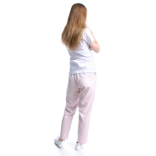 istock Woman in white t-shirt standing 1128502254
