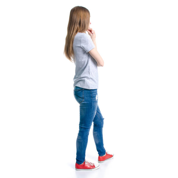 istock Woman in jeans t-shirt thinking 1128502434